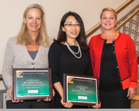 Tabitha Dubois (right), LEI's Director of Finance and Administration, gave the Lean Accounting Student Award to MUM’s Ye Shi, and the Lean Accounting Professor Award to WWU's Dr. Audrey Taylor.
