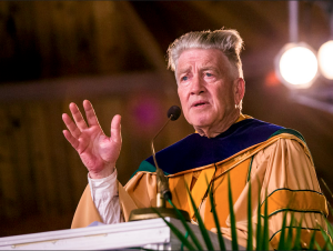 Cody Weber/ for The Hawk Eye Filmmaker David Lynch speaks Saturday at Maharishi University of Management in Fairfield. Lynch was featured and feted at the 41st commencement ceremony with graduates from 53 countries in attendance.